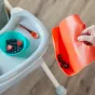 Мек силиконов лигавник Roll n Go оранжев - Tommee Tippee