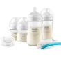 Комплект за новородено с 4 шишета за хранене Natural Response, залъгалка Ultra Soft и четка за почистване Philips AVENT